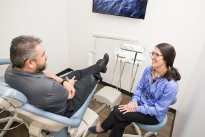 Dr. Bassett and patient at Paloma Dental in Denver, Co